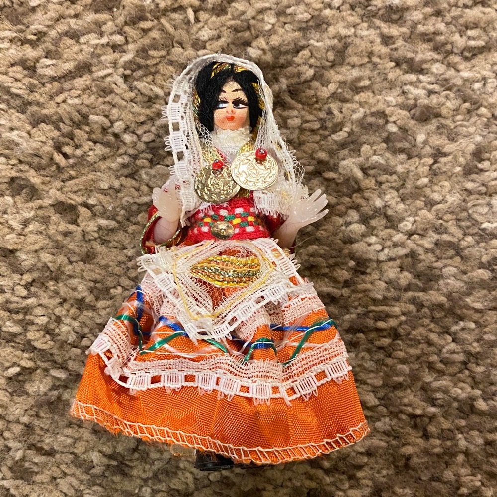 Vintage Greek Collectible Doll with Orange Dress.
